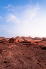 Portrait - Wadi Rum, Jordan. A beautiful vibrant sunset, Arabian desert, a dystopian martian landscape with unique rock formations and dunes. Backdrop for graphic resource or copy space
