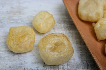 Leather crackers, some regions call them rambak or jangek, are crackers made from cow skin or buffalo skin which are processed with spices and flavor enhancers.