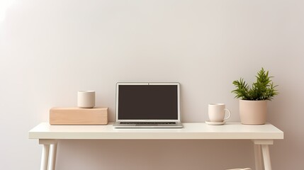 Minimalistic office desk with a modern laptop, coffee mug, and a chic desk organizer