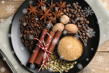 Different spices on wooden table, top view. Cinnamon, anise, cloves, allspice, nutmegs, brown...