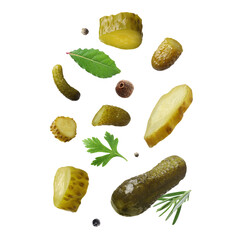 Tasty pickled cucumbers, herbs and spices falling on white background