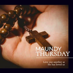 Fotobehang Composition of maundy thursday text over hand holding rosary © vectorfusionart