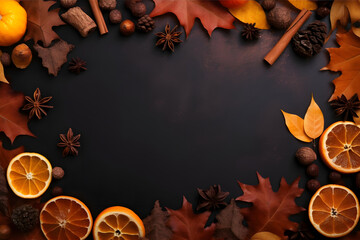  beautiful arrangement of autumn-themed items. The sliced oranges, cinnamon sticks, and leaves create a warm and cozy atmosphere. The bright color of the oranges contrasts with the dark background