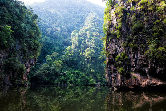 Tasik Cermin or Mirror Lake, Ipoh, Malaysia - Tasik Cermin, or Mirror Lake, is a stunning hidden lake surrounded by limestone karst towers. Located near Ipoh town, Perak state, Malaysia.