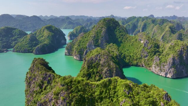 paradise Vietnam vacation, Halong bay in Vietnam, sunny summer view of Halong bay, famous Vietnamese tourist destination drone view