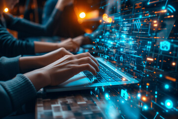 Close-up of business people's hands working on laptops in modern office