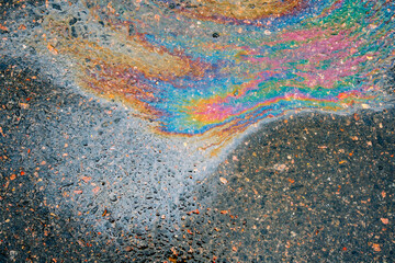 Petrol stain on asphalt road