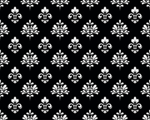 Wallpaper in the style of Baroque. Seamless vector background. White and black floral ornament. Graphic pattern for fabric, wallpaper, packaging. Ornate Damask flower ornament