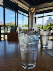cool glass of water on table