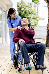 Caregiver nurse take care a Senior patient outside home. Nurse helping senior people.