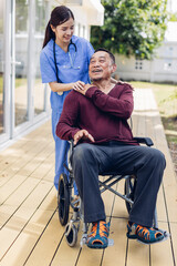 Caregiver nurse take care a Senior patient outside home. Nurse helping senior people.