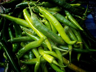 Many green chilies sold in the Thai market