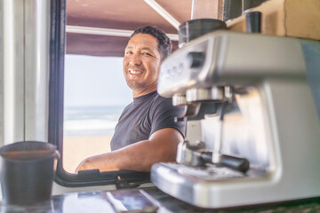 Smiling barista ready to work in a food truck
