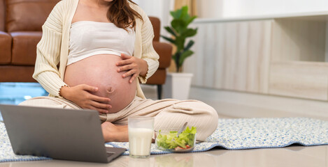 Pregnancy happy smiling Mother woman hugging and smiling expecting hold baby in belly, woman...