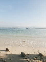 Beautiful view of waving blue sea and sky in tropical summer, Pangandaran beach, Java, Indonesia. Travel or vacation