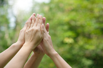 hand up of people working symbol Join forces teamwork assemble corporate meeting show  quality and...