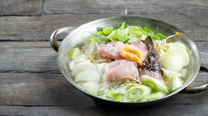 Monkfish Soup , A dish made with monkfish as the main ingredient and boiled with bean sprouts