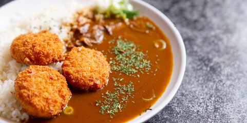 Pork cutlet with delicious Curry sauce on a plate