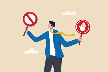 Forbidden, prohibited or restriction, stop sign caution or banned attention, illegal, wrong or false information to avoid, risk and danger concept, businessman holding forbidden crossed and stop sign.