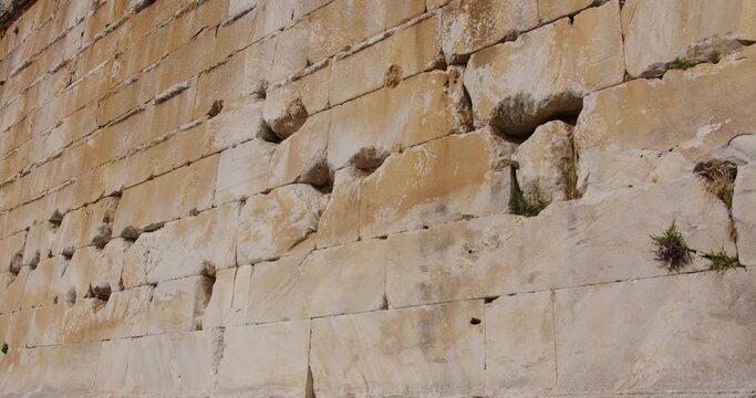 Close up of ancient stone wall of theater in Miletus.