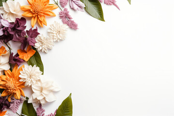 Assortment of leaves and flowers on white background