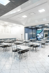 Interior of light colored canteen at the business center