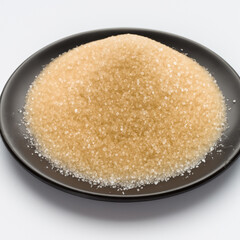 皿の上の茶色のざらめ砂糖　AI画像