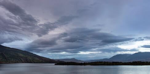 Panoramic view of a Lake Bin el Ouidane with cloudy sky in Morocco, Africa, in the evening