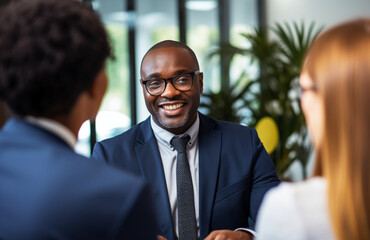 African american financial advisor handshaking with his clients