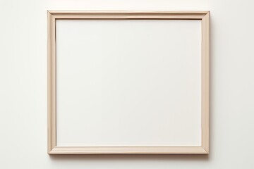 A close-up snapshot reveals a mockup awaiting your creative touch, showcased on a pristine white wall, featuring a warm wood frame that adds a touch of natural elegance.