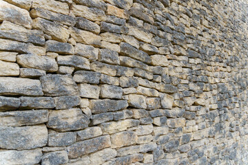 photographic background of a stacked stone wall