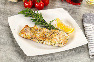 Baked salmon fish served rosemary