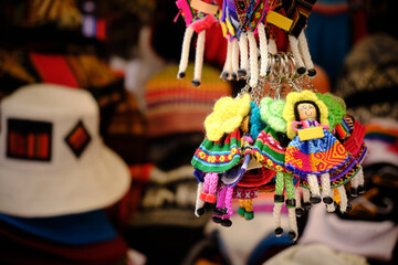 colorful keychains for tourists handmade in la paz bolivia - obrazy, fototapety, plakaty