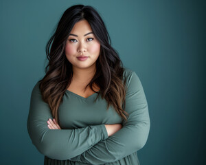Fototapeta premium Confident curvy Asian woman portrait