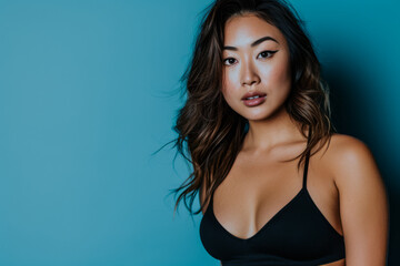 Fototapeta premium Confident curvy Asian woman portrait
