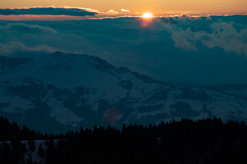 Beautiful sunrise at winter in Ceahlau Mountains, Romania