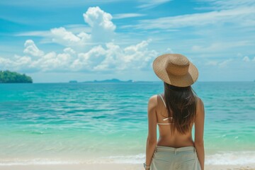 Asian lady enjoying peaceful beach, serene ocean vacation
