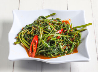 sambal kangkong served in dish isolated on table top view of singapore food
