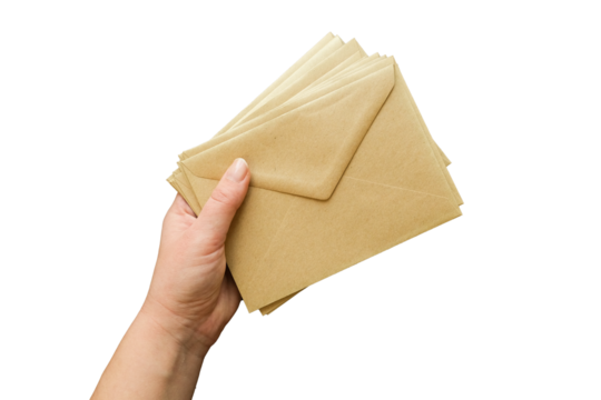 A hand holds a stack of closed kraft envelopes. Letters in hand on transparent background