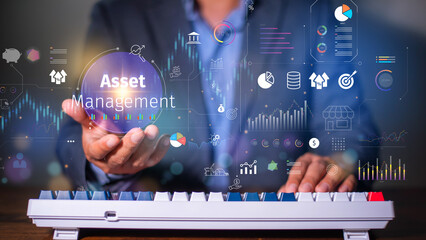 Asset management concept, Businessman Holding asset management and Icon  on virtual display....