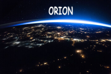 Orion Multi-Purpose Crew Vehicle Soaring Above Earth in the Serenity of Space. Elements of this image are furnished by NASA - Powered by Adobe