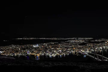Rucksack night view to the city of Tromso © johannes81