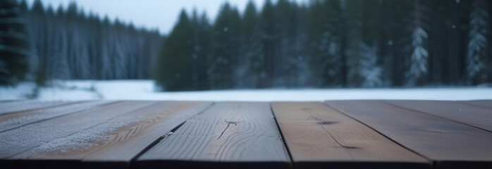Empty rustic wooden table top on blur background of winter nordic forest. Cloudy moody sky. Abstract snowy counter. Mockup for Eco tourism, hiking ad. Free space for text. Frame for display. Snow dust - obrazy, fototapety, plakaty
