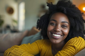 Mid adult African woman smiling at home, relaxed and happy - Powered by Adobe