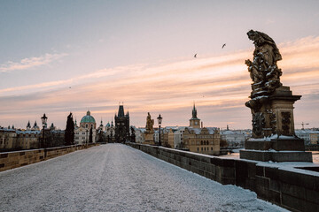 Snowy Charles Bridge in Prague in winter, no people, morning