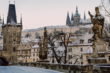 Snowy Charles Bridge in Prague in winter, no people, morning