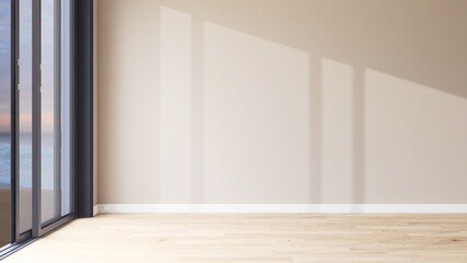 Empty room with large blank beige brown wall, wood laminate parquet floor in evening sunlight from...