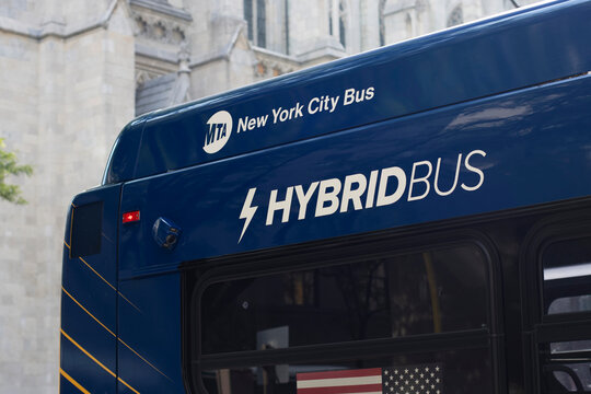 New York, NY, USA - July 5, 2022: Hybrid Bus sign is seen on a New York City bus operated by the Metropolitan Transportation Authority (MTA).