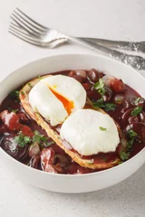 Foto op Plexiglas Eggs meurette or poached eggs with red wine sauce closeup on the plate on the table. Vertical © FomaA