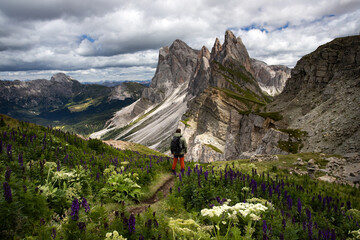 Mountain view with climber, Seceda mountain, Dolomites, Italy.